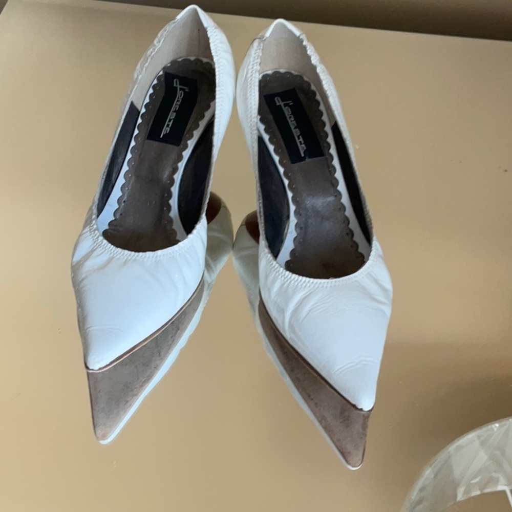 Wonderful kitten heel white patent shoes.